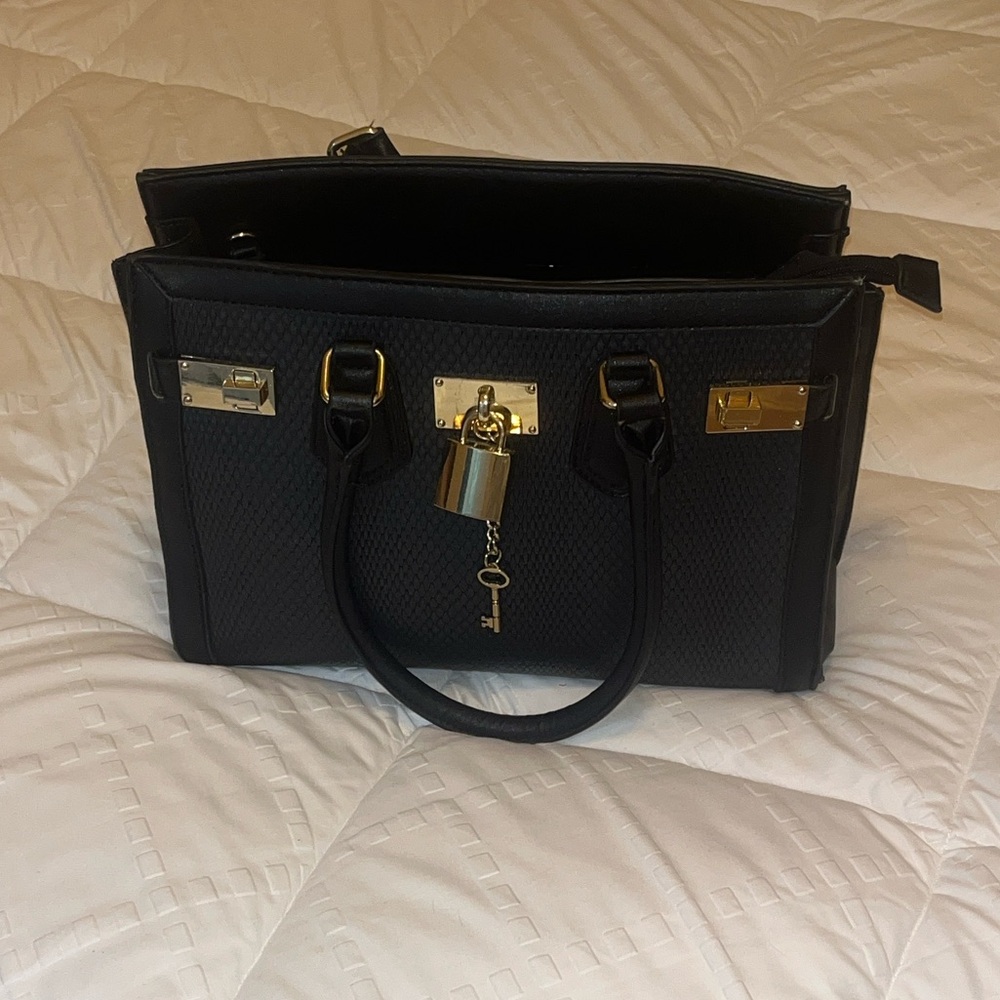 Aldo Black Buckle Handbag with Gold Accents